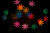 bokeh shape effect, mulitcoloured starbursts