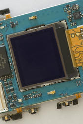 Macro image of the circuit board from a flip-phone mobile