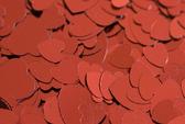 a background of metallic red heart symbols