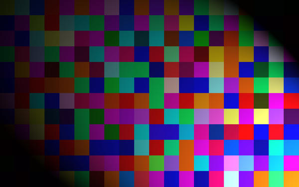 a grid of colurful squares under a spotlight effect