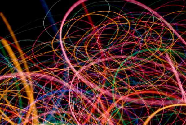 weaving and intertwined lines of light of varying thicknesses