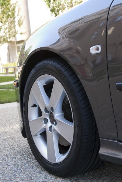an alloy wheel on the front of a modern car