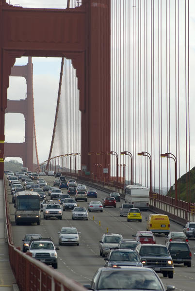 looking along the golden gate bridge traffic crossing on highway 1, california