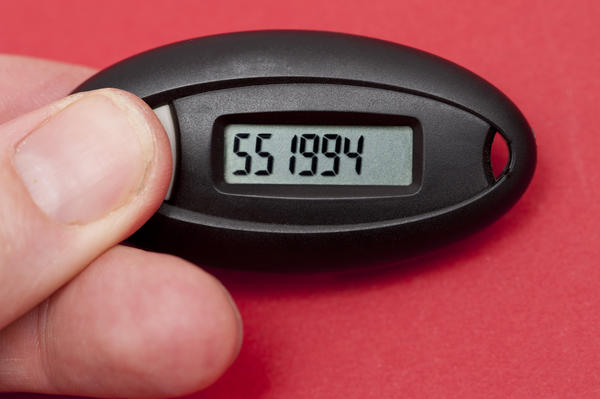 Two part authentication with a handheld digital device to generate random code or numbers to be entered in addition to a password when accessing a secure site