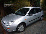 a silver ford focus car