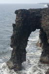 black volcanic rock arch at Holei on the coast of Hawaiis Big Island