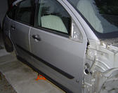 car door panels in a workshop