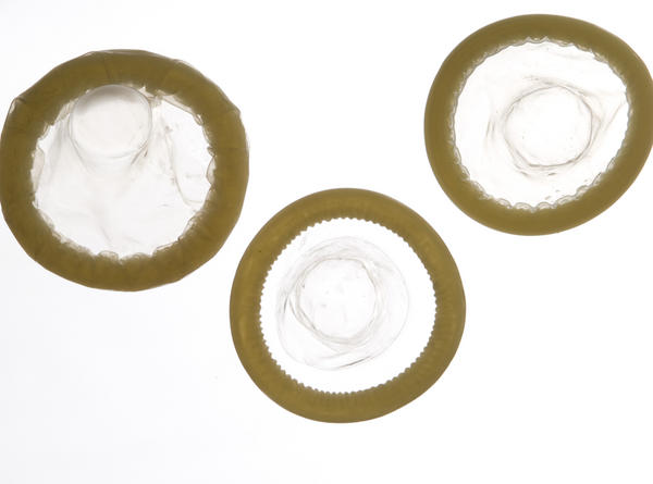 three back lit condoms