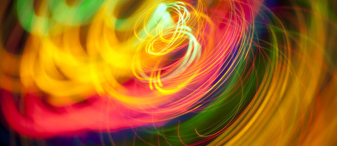 random circles colourful background pattern of circular loops painted with multi coloured lights